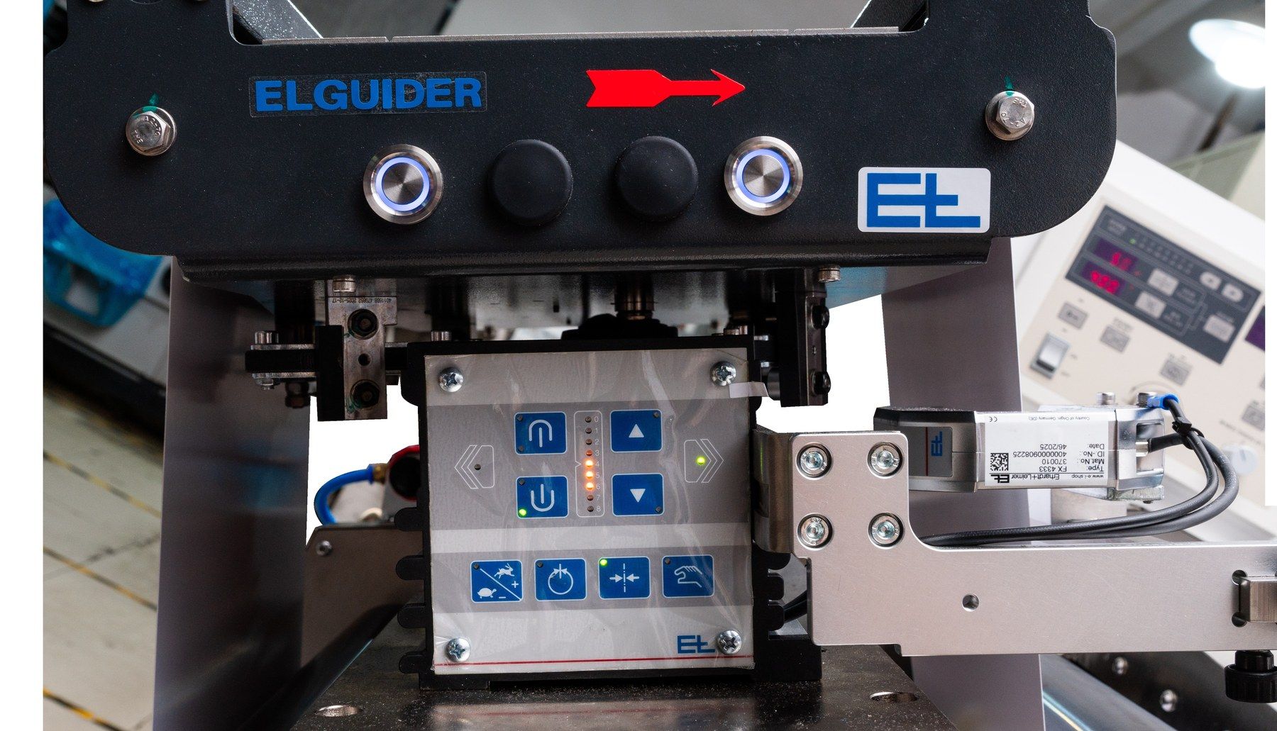 Web guide unit with control keypad at the infeed of the FX-450
