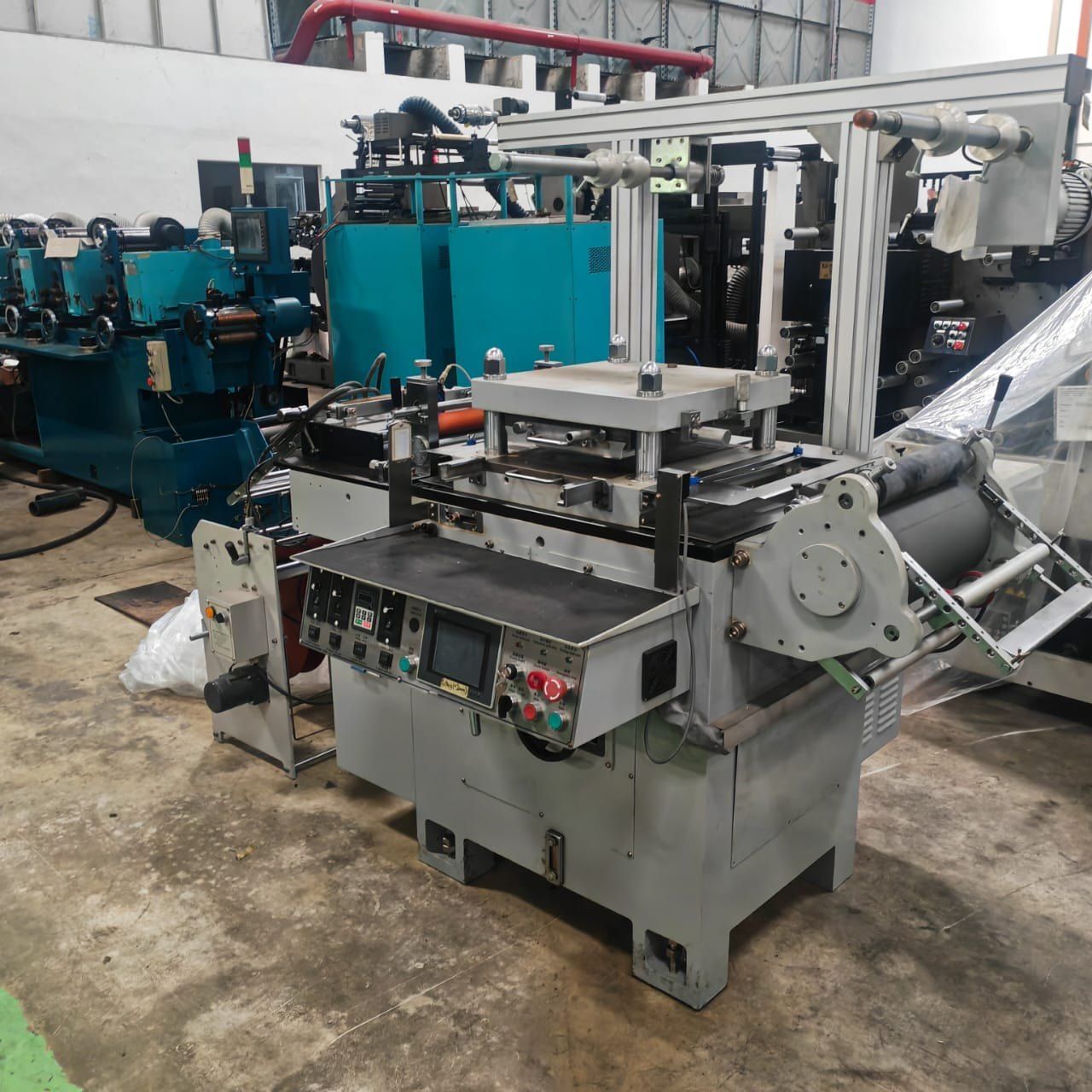 Refurbished flat bed die cutting machine in the warehouse